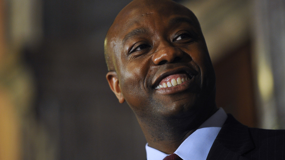 U.S. Rep. Tim Scott smiles during a news conference announcing him as Jim DeMint's replacement in the U.S. Senate at the South Carolina Statehouse on Monday in Columbia.