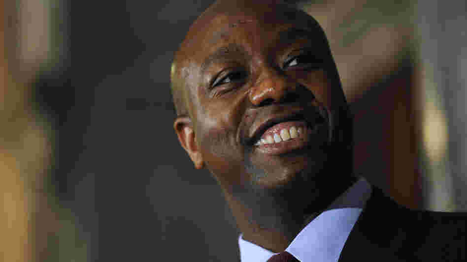 U.S. Rep. Tim Scott smiles during a news conference announcing him as Jim DeMint's replacement in the U.S. Senate at the South Carolina Statehouse on Monday in Columbia.