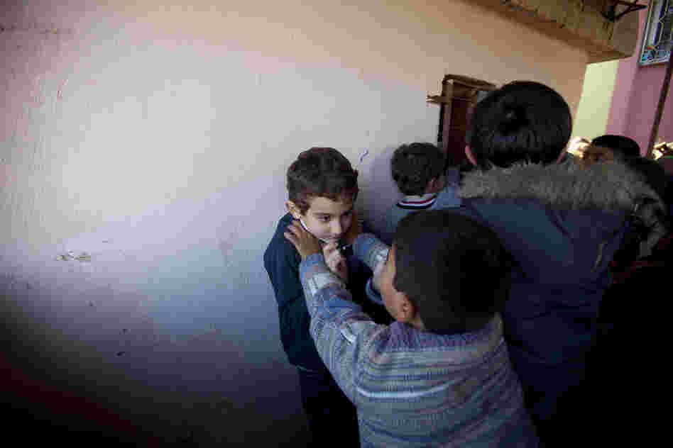 Many children wrestle and participate in aggressive play during recess, while others eat snacks and socialize. This rough play can be common with traumatized children.