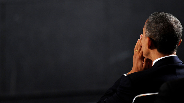 President Obama attends a vigil for the Sandy Hook Elementary School shooting victims on Sunday in Newtown, Conn.