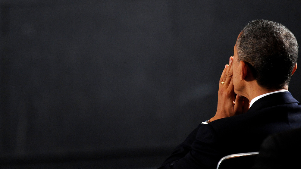 President Obama attends a vigil for the Sandy Hook Elementary School shooting victims on Sunday in Newtown, Conn.