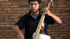 Cellist Juan Manuel Chavez, whose instrument is made from an oil can and discarded bits of wood. Cellist Juan Manuel Chavez, whose instrument is made from an oil can and discarded bits of wood.