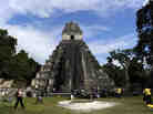 Tourists are seen in front of the "Gran Jaguar" Mayan temple at the Tikal archaeological site in Guatemala, where ceremonies will be held to celebrate the end of the Mayan cycle known as Baktun 13 and the start of the new Maya Era on December 21.