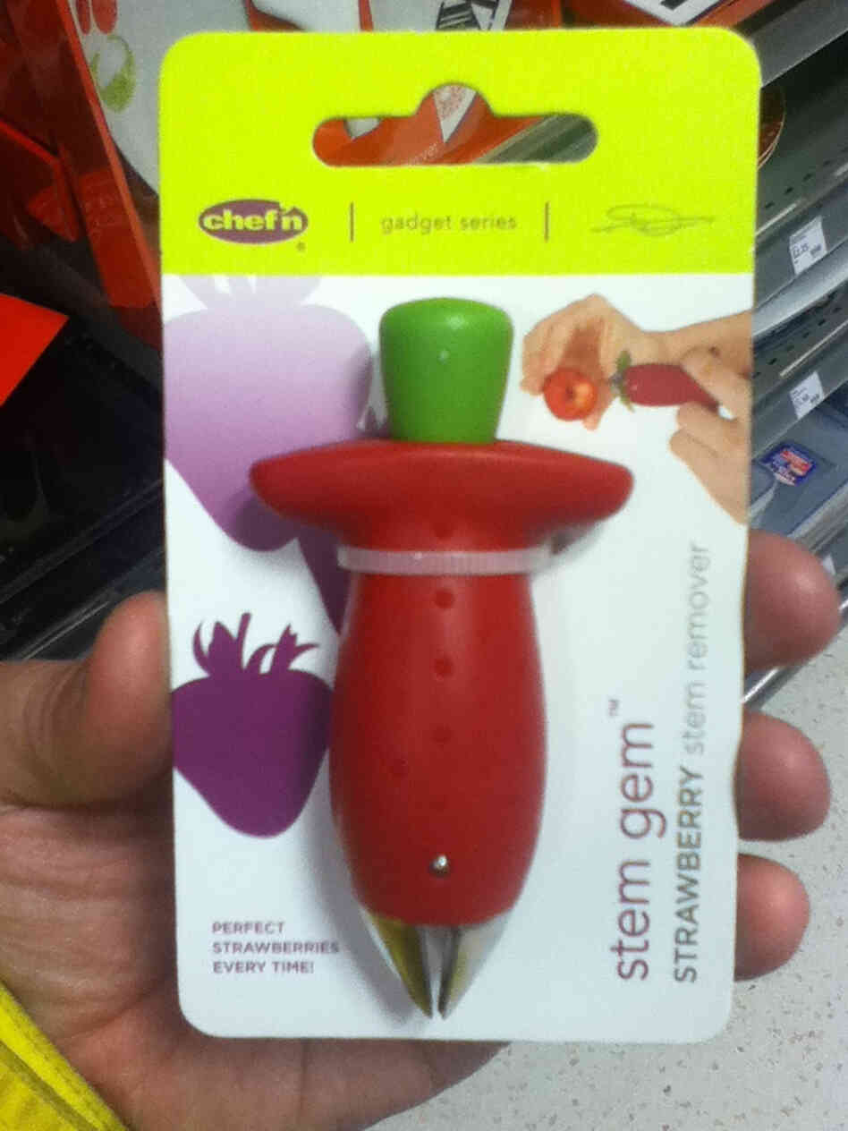 A strawberry stem remover. A strawberry stem remover.