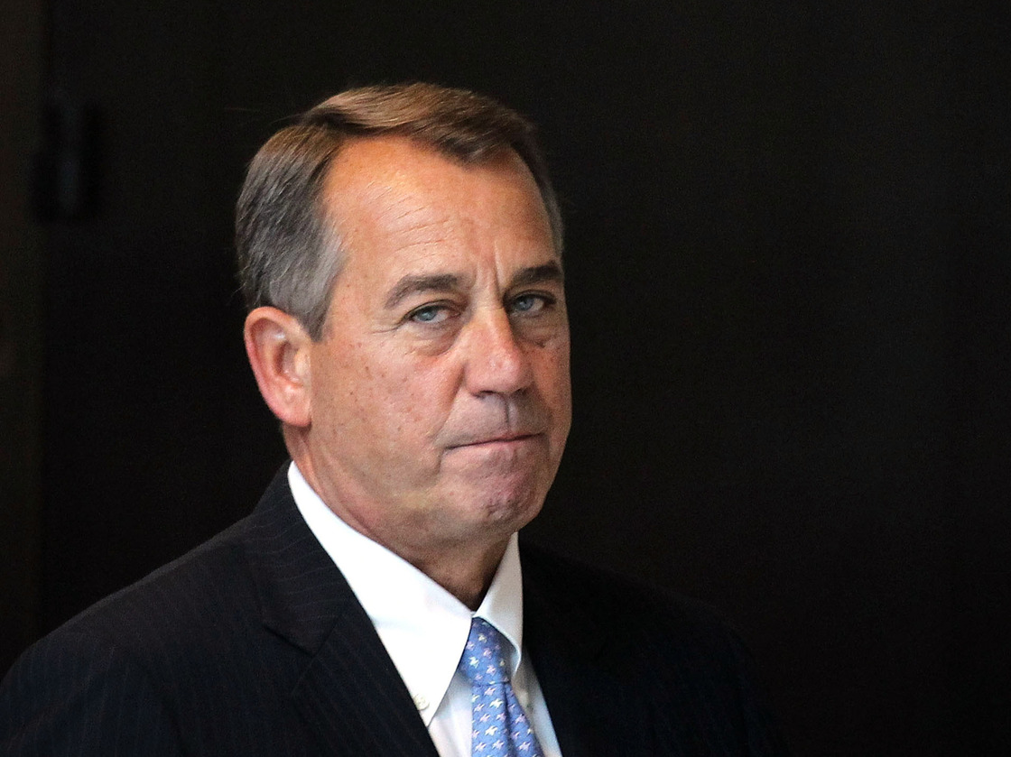 House Speaker John Boehner (R-OH) arrives on Capitol Hill Thursday. The House has postponed an expected vote on the tax portion of the fiscal cliff cuts.