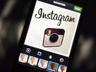 Instagram backed down from a planned policy change that appeared to clear the way for the mobile photo sharing service to sell pictures without compensation, after users cried foul. Instagram backed down from a planned policy change that appeared to clear the way for the mobile photo sharing service to sell pictures without compensation, after users cried foul.
