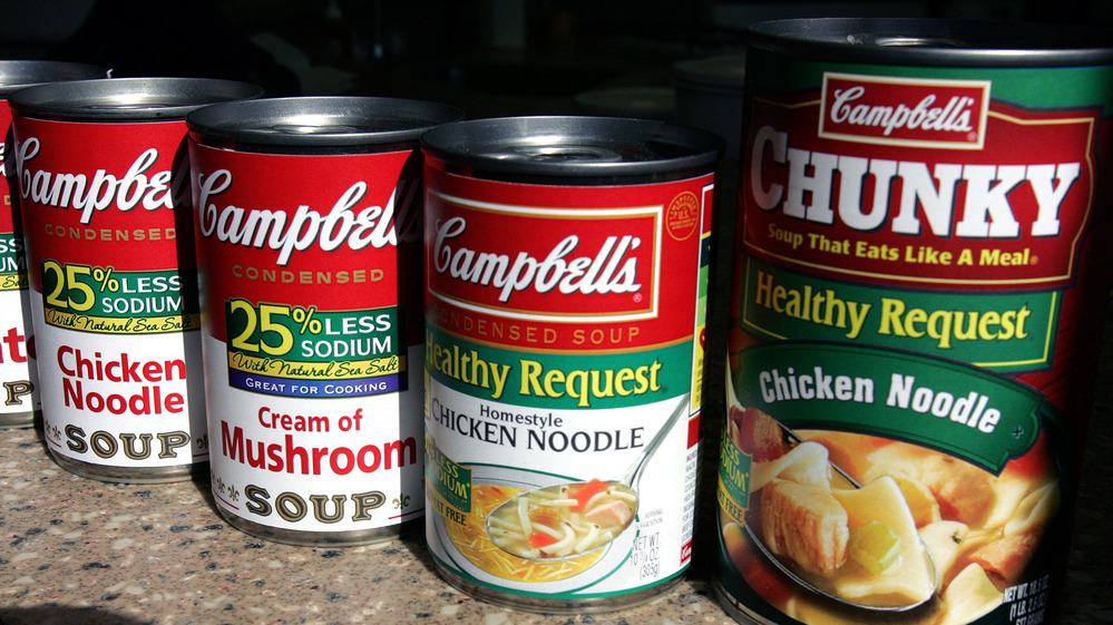 Food companies have begun quietly reducing salt in regular foods because low-salt items like these don't sell as well.