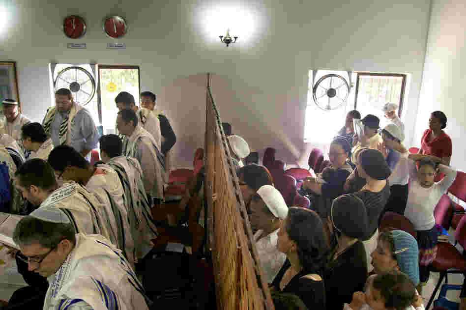 The congregation prays at the synagogue in Bello.