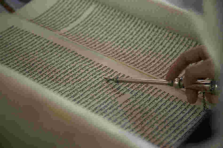 A metallic yad, or hand in Hebrew, is used while worshippers read from the Torah in Bello's synagogue.
