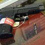 A Sig Sauer handgun on sale at a shop in Tucker, Ga. A Sig Sauer handgun on sale at a shop in Tucker, Ga.