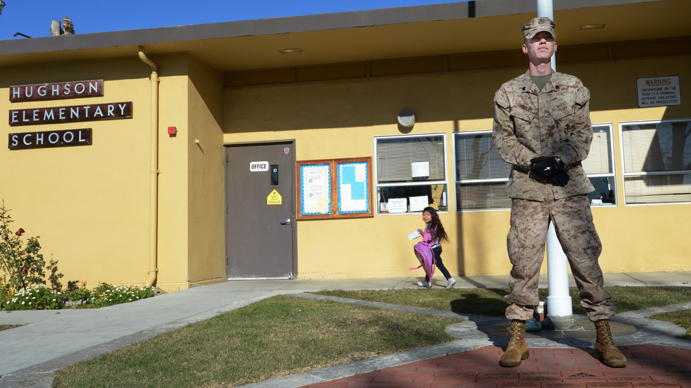 U.S. Marine Corps Reserve Sgt. Craig Pusley stood guard Wednesday at Hughson Elementary School in Modesto, Calif. U.S. Marine Corps Reserve Sgt. Craig Pusley stood guard Wednesday at Hughson Elementary School in Modesto, Calif.