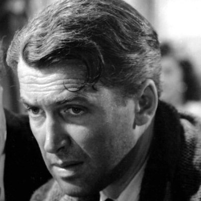 When life gets him down, George Bailey (James Stewart) escapes to Giuseppe Martini's (William Edmunds) neighborhood bar.