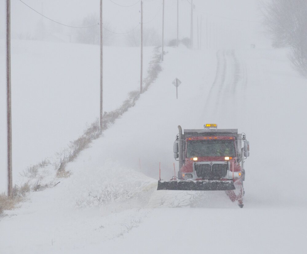 A snow plow made its way down a county road in Waupun, Wis., earlier today.