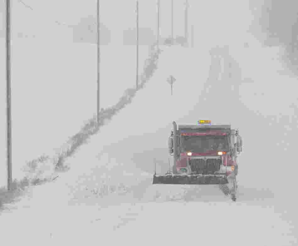 A snow plow made its way down a county road in Waupun, Wis., earlier today.