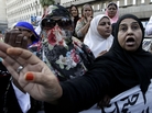 Pakistani health workers demonstrate against the slayings of their colleagues on Wednesday Dec. 19, 2012. Pakistani health workers demonstrate against the slayings of their colleagues on Wednesday Dec. 19, 2012.