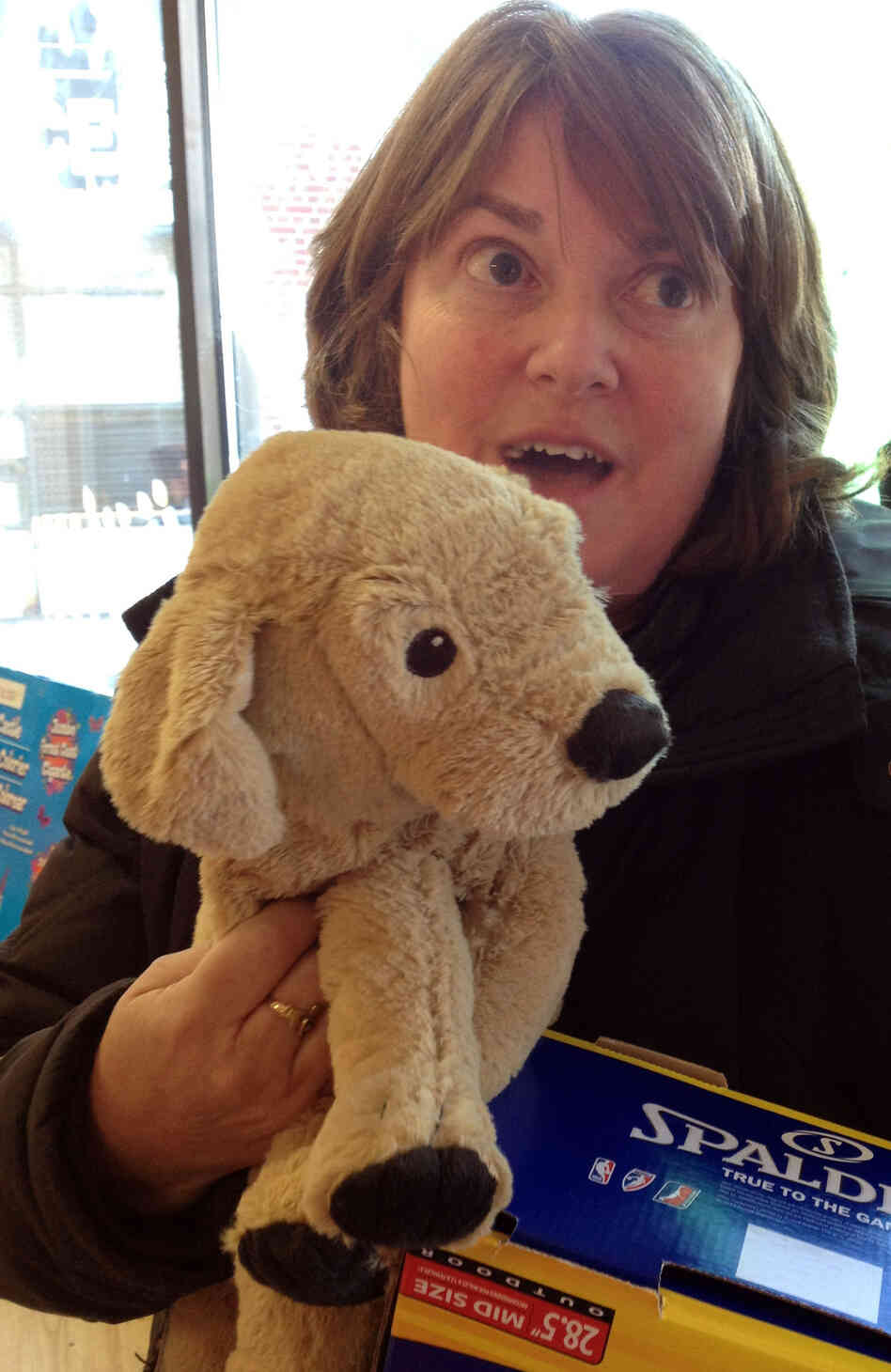 "I got this stuffed puppy, that's just such a love," says toy shop visitor Eileen Pepel, whose extended family lost several homes on Staten Island in Hurricane Sandy. "I got this stuffed puppy, that's just such a love," says toy shop visitor Eileen Pepel, whose extended family lost several homes on Staten Island in Hurricane Sandy.