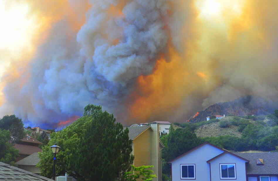 The fire was already burning in their Waldo Canyon neighborhood when Janet Wilson and her partner Stephen Gandy finished packing their cars and joined the evacuation. The fire was already burning in their Waldo Canyon neighborhood when Janet Wilson and her partner Stephen Gandy finished packing their cars and joined the evacuation.