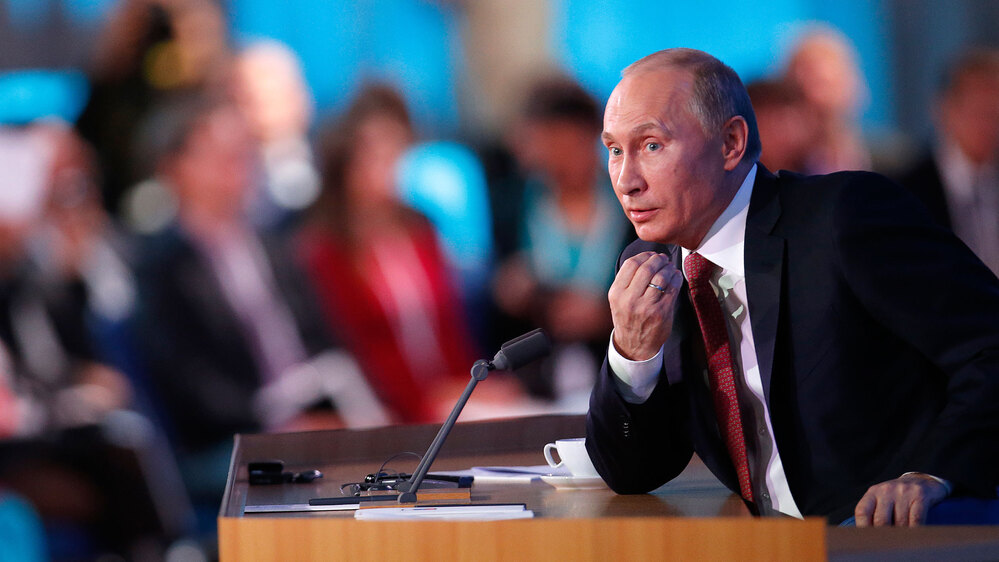 Russian President Vladimir Putin speaks during a news conference in Moscow, Russia, on Thursday. Putin says a draft bill banning U.S. adoptions of Russian children is a legitimate response to a new U.S. law that calls for sanctions on Russian officials deemed to be human rights violators. Russian President Vladimir Putin speaks during a news conference in Moscow, Russia, on Thursday. Putin says a draft bill banning U.S. adoptions of Russian children is a legitimate response to a new U.S. law that calls for sanctions on Russian officials deemed to be human rights violators.