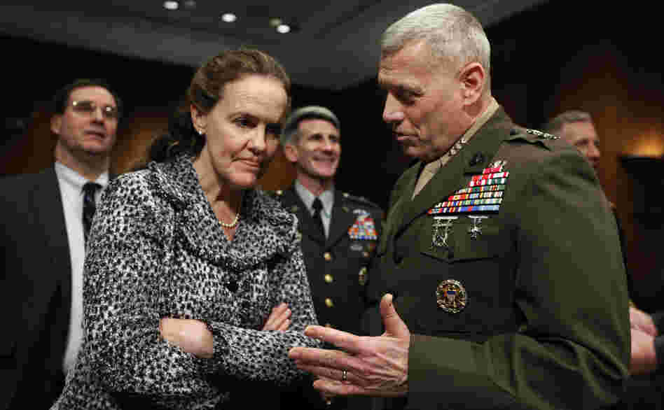 Defense Undersecretary for Policy Michele Flournoy talks with Marines Lt. Gen. John Paxton on Capitol Hill in 2010. Flournoy has since left her position to spend more time with her three children.