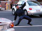 Retired police officer Tony Lepore performs his dance routine while directing traffic in 2004 in downtown Providence, R.I. Retired police officer Tony Lepore performs his dance routine while directing traffic in 2004 in downtown Providence, R.I.