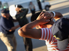 Employees with the U.S. Immigration and Customs Enforcement agency search Guatemalan immigrants before they are put aboard a deportation flight to Guatemala City on June 24, 2011, in Mesa, Ariz. Employees with the U.S. Immigration and Customs Enforcement agency search Guatemalan immigrants before they are put aboard a deportation flight to Guatemala City on June 24, 2011, in Mesa, Ariz.