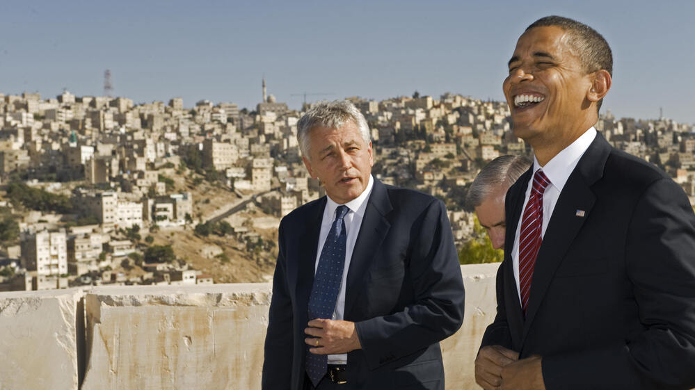Sen. Chuck Hagel, R-Neb., and then-presidential candidate Barack Obama tour the citadel with the hillsides of Amman, Jordan, in the background, in July 2008.