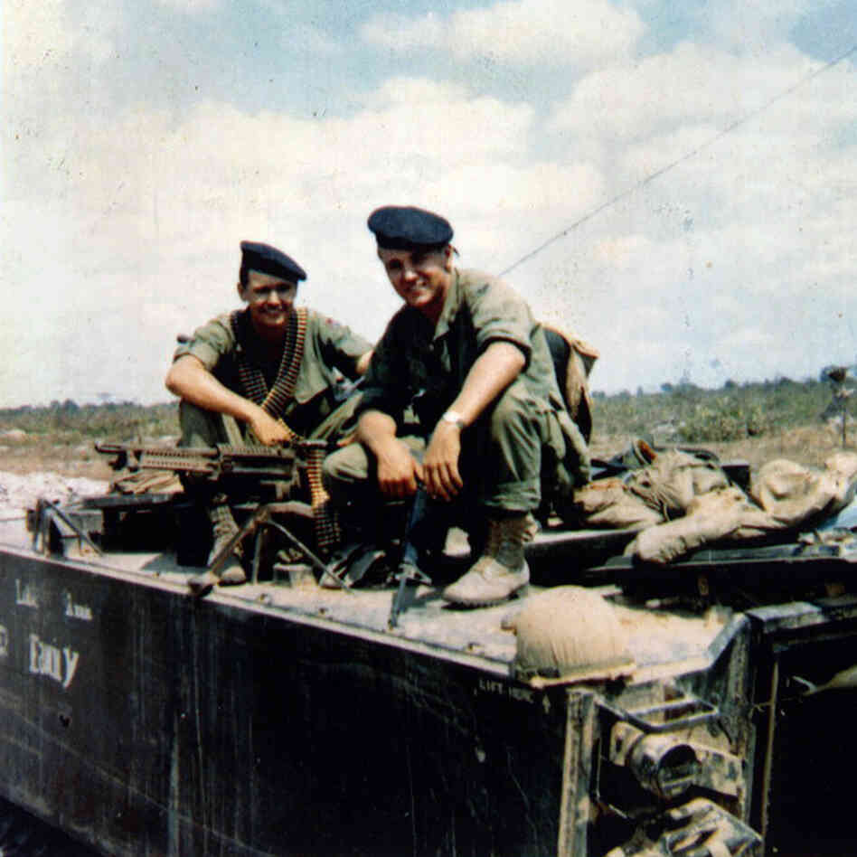 Chuck Hagel (right) and his younger brother Tom sit atop an armored personnel carrier in Vietnam, in a photo taken in or around 1968. The Hagel brothers were squad leaders with the U.S. Army's 9th Infantry Division in the Mekong River Delta.