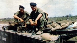 Chuck Hagel (right) and his younger brother Tom sit atop an armored personnel carrier in Vietnam, in a photo taken in or around 1968. The Hagel brothers were squad leaders with the U.S. Army's 9th Infantry Division in the Mekong River Delta.
