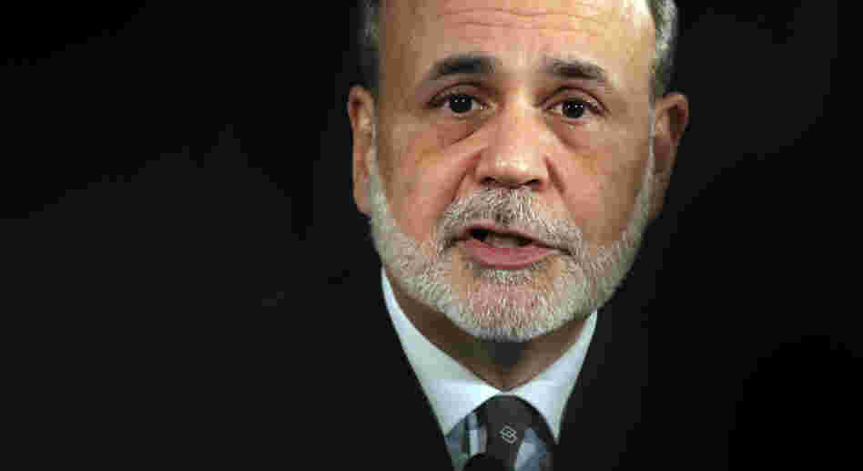 Federal Reserve Chairman Ben Bernanke speaks during a news conference in Washington on Dec. 12. Some economists worry the Fed has set the stage for inflation as well as stock and housing bubbles by keeping interest rates low.