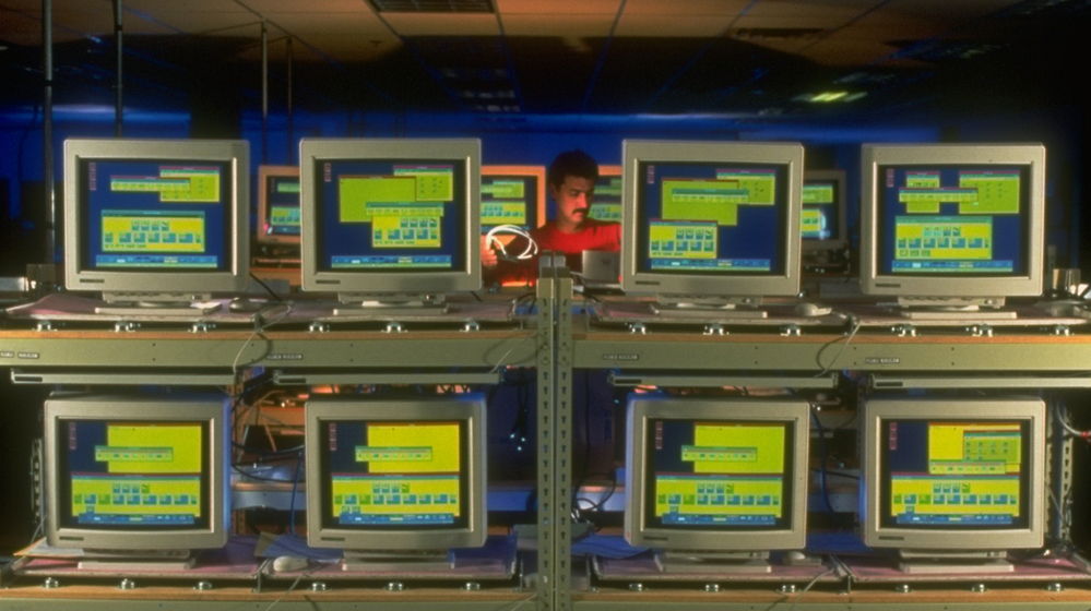 A lone employee oversees Hewlett-Packard workstations being assembled at a plant on Jan. 1, 1993. Huge improvements in computer technology propelled the economy during that decade. A lone employee oversees Hewlett-Packard workstations being assembled at a plant on Jan. 1, 1993. Huge improvements in computer technology propelled the economy during that decade.