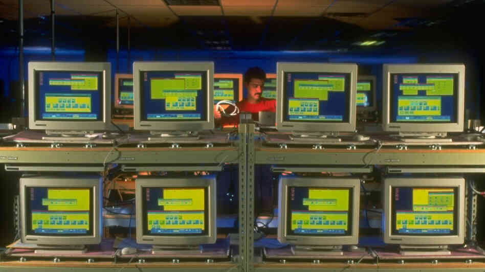 A lone employee oversees Hewlett-Packard workstations being assembled at a plant on Jan. 1, 1993. Huge improvements in computer technology propelled the economy during that decade.