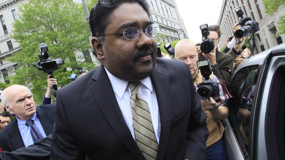Raj Rajaratnam, center, billionaire co-founder of Galleon Group, is surrounded by photographers as leaves Manhattan federal court May 11 after being convicted of insider trading charges.