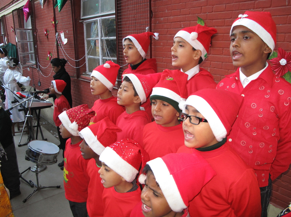 Carolers from St. Columba's School in New Delhi stage their annual Christmas program, where the student body is Catholic, Sikh and Hindu.