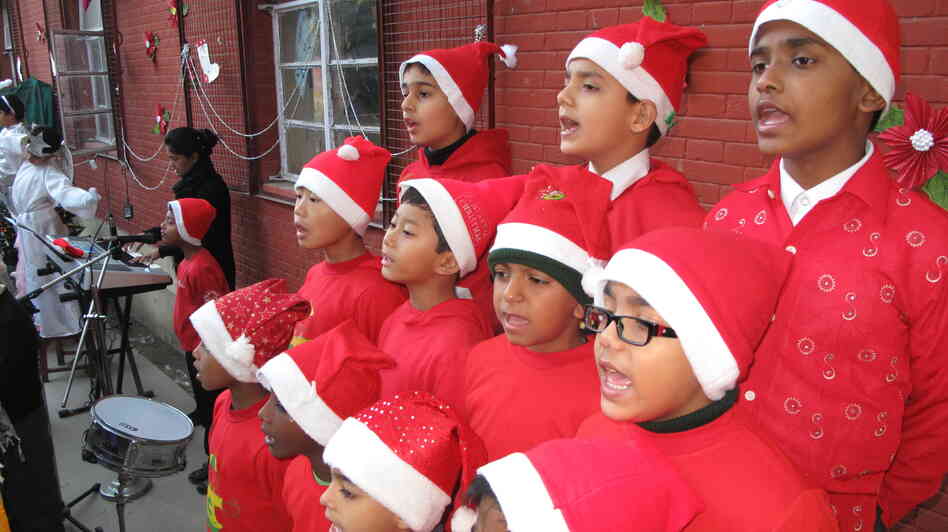 Carolers from St. Columba's School in New Delhi stage their annual Christmas program, where the student body is Catholic, Sikh and Hindu.