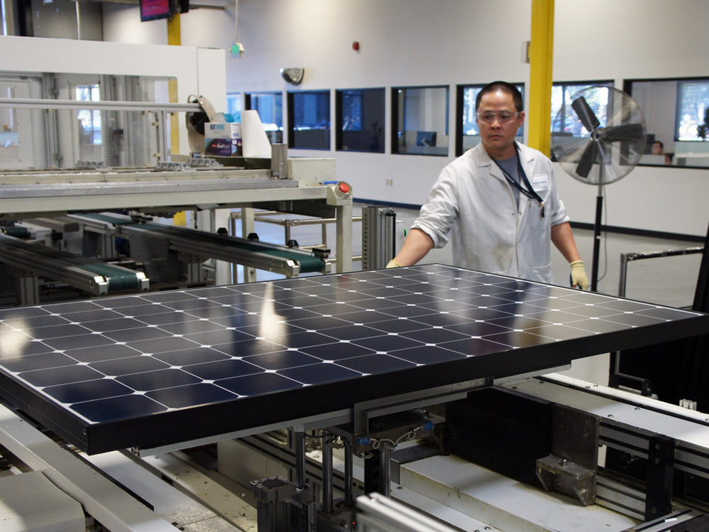 Solar panels come off the line at SunPower's solar manufacturing plant near San Jose, Calif.