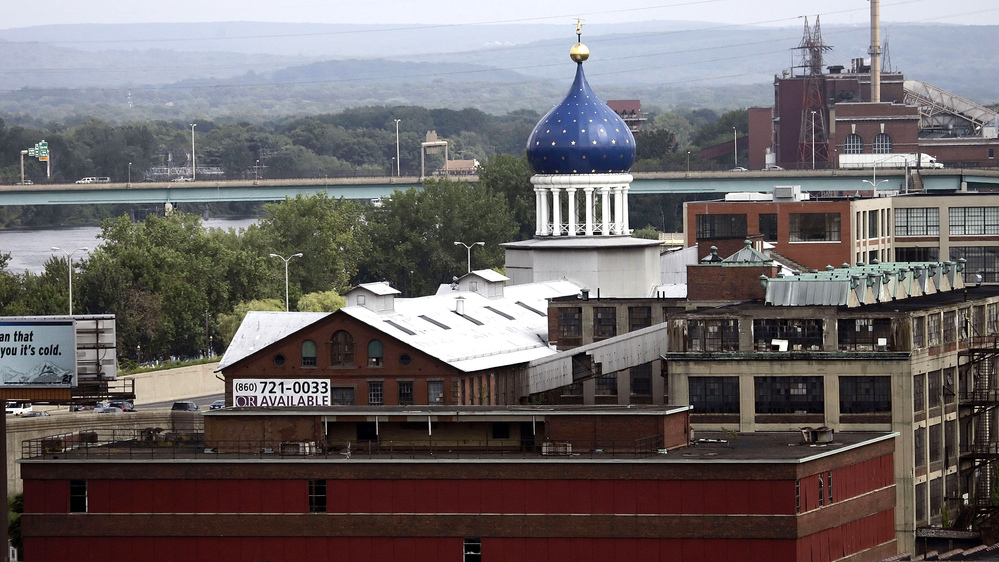The Coltsville factory's blue dome has long been a landmark in Hartford, Conn. The Colt Patent Firearms Manufacturing Company began building factories in the area in 1855. The Coltsville factory's blue dome has long been a landmark in Hartford, Conn. The Colt Patent Firearms Manufacturing Company began building factories in the area in 1855.