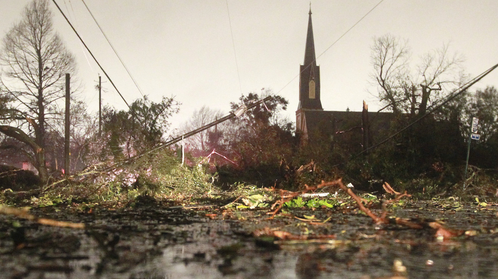 After the storm in Mobile: Downed trees and power lines on Christmas Day. After the storm in Mobile: Downed trees and power lines on Christmas Day.