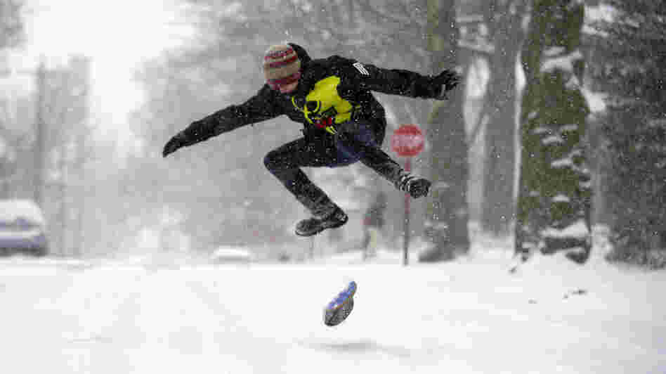 A large and powerful winter storm brought snow and ice to large sections of the Midwest and East Coast Wednesday. The weather made roads treacherous in many areas. But in Pittsburgh, Pa., Chandler Fescemeyer, 17, found a reason to break out a snowboard.