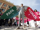 A man wears a costume reading "Dad" and "Mom" during a demonstration against gay marriage and adoption by same-sex couples in Nice, France, in October. A man wears a costume reading "Dad" and "Mom" during a demonstration against gay marriage and adoption by same-sex couples in Nice, France, in October.