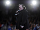 French actor Gerard Depardieu speaks outside Paris in March. He recently said he was moving to neighboring Belgium to avoid France's new top tax rate of 75 percent. The news ignited a debate in France over taxes and patriotism. French actor Gerard Depardieu speaks outside Paris in March. He recently said he was moving to neighboring Belgium to avoid France's new top tax rate of 75 percent. The news ignited a debate in France over taxes and patriotism.