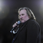French actor Gerard Depardieu speaks outside Paris in March. He recently said he was moving to neighboring Belgium to avoid France's new top tax rate of 75 percent. The news ignited a debate in France over taxes and patriotism.