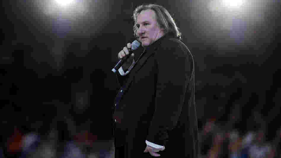 French actor Gerard Depardieu speaks outside Paris in March. He recently said he was moving to neighboring Belgium to avoid France's new top tax rate of 75 percent. The news ignited a debate in France over taxes and patriotism.