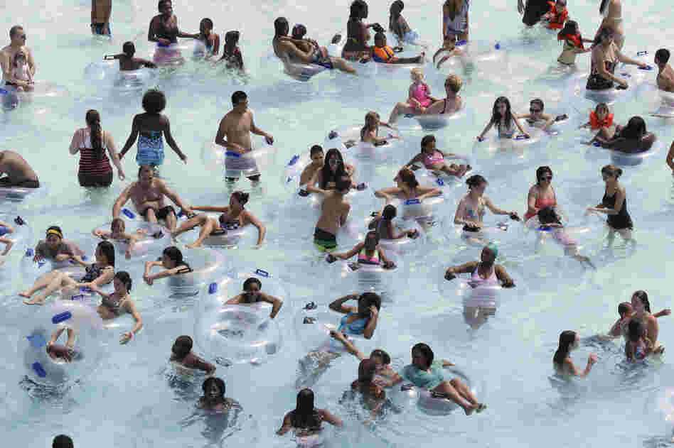 Swimmers try to keep cool in near-100-degree temperatures at Red Oaks Waterpark in Madison Heights, Mich., June 28.