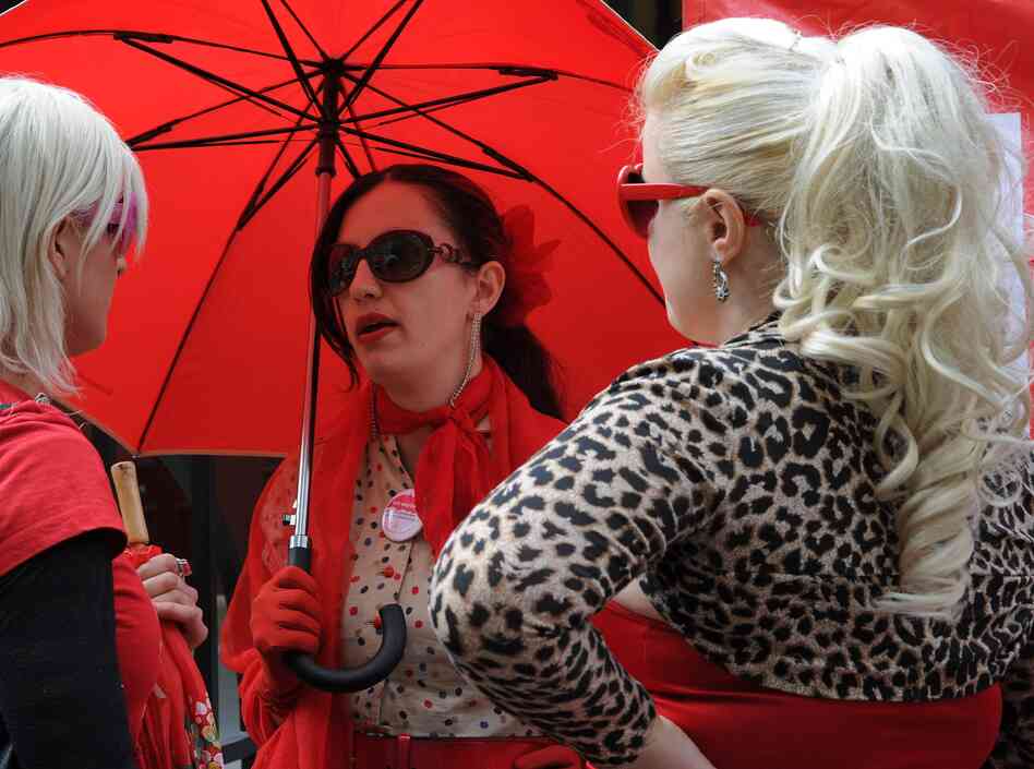 Supporters of the Scarlet Alliance Australian Sex Workers Association demand better legal protections at a rally outside the New South Wales Parliament in September.