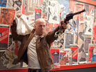 Joe (Bruce Willis) fights a younger version of himself in Looper. Joe (Bruce Willis) fights a younger version of himself in Looper.