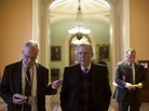 Senate Minority Leader Mitch McConnell walks toward his office after speaking on the Senate floor on Capitol Hill. McConnell and other congressional leaders will meet with President Obama Friday. Senate Minority Leader Mitch McConnell walks toward his office after speaking on the Senate floor on Capitol Hill. McConnell and other congressional leaders will meet with President Obama Friday.