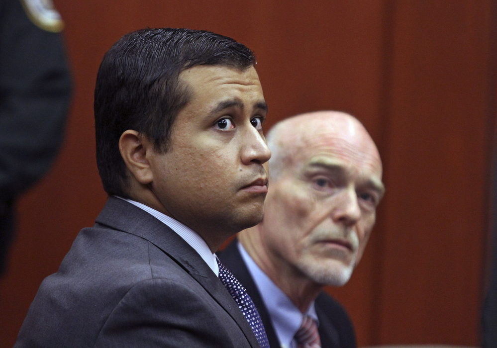 George Zimmerman (left) and his attorney appear in court for a bond hearing in June. Zimmerman's case sparked a nationwide debate about so-called "stand your ground" laws.
