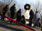 People visit a memorial outside Sandy Hook Elementary School in Newtown, Conn., on Dec. 15. People visit a memorial outside Sandy Hook Elementary School in Newtown, Conn., on Dec. 15.