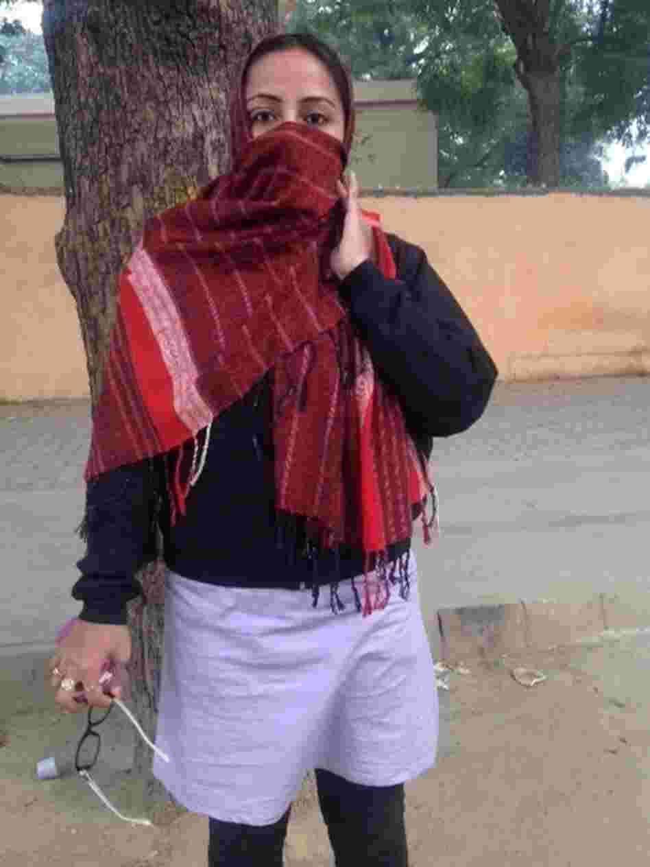 Nasreen Jahan, who was taking part in a protest, said that after her divorce, her husband attacked her with acid, disfiguring her face.