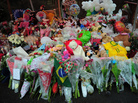 A makeshift shrine to the victims of the school shooting in Newtown, Conn. Slate and a citizen journalist are trying to track gun deaths across the nation since that Dec. 14 mass shooting. A makeshift shrine to the victims of the school shooting in Newtown, Conn. Slate and a citizen journalist are trying to track gun deaths across the nation since that Dec. 14 mass shooting.